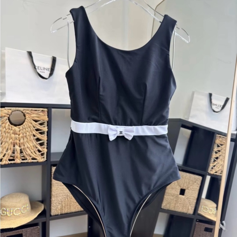 Sleek Black One-Piece Swimsuit with White Bow Belt - Picture 4 of 6